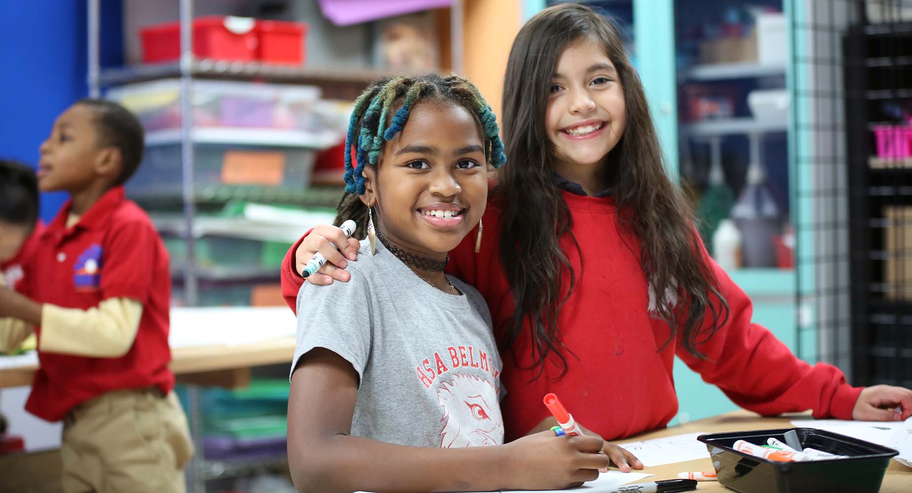 Teacher helping student